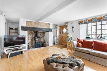 The feature fireplace has a fabulous wood-burner to keep you toasty throughout the year.