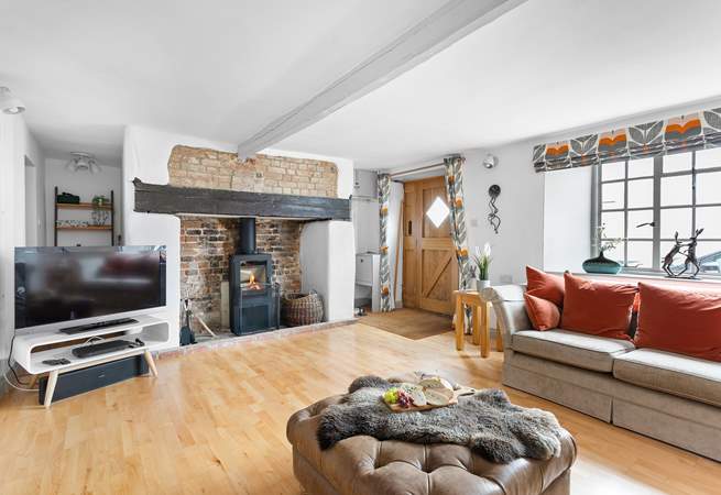 The feature fireplace has a fabulous wood-burner to keep you toasty throughout the year.