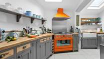 The stunning kitchen is beautifully constructed.