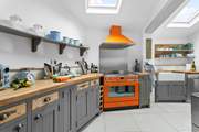 The stunning kitchen is beautifully constructed.