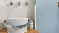 With feature wash-basin.