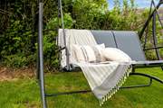 Grab a book and chill out on the swing chair.