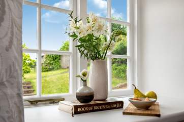 The first bedroom looks out over the garden
