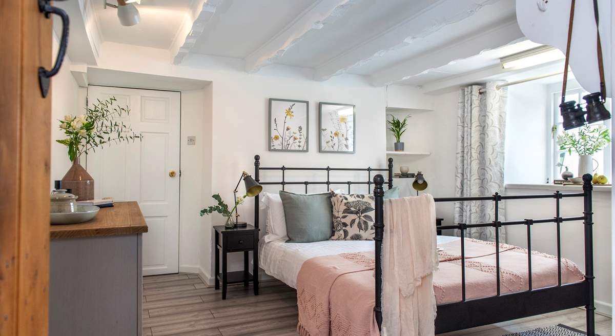 All four bedrooms are beautifully styled.