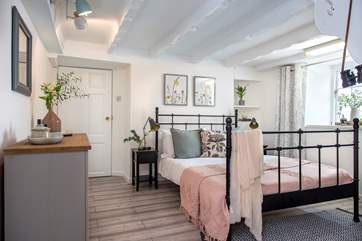 The first bedroom is on the ground floor, ideal for those who have any mobility issues or like to grab a midnight snack from the kitchen!