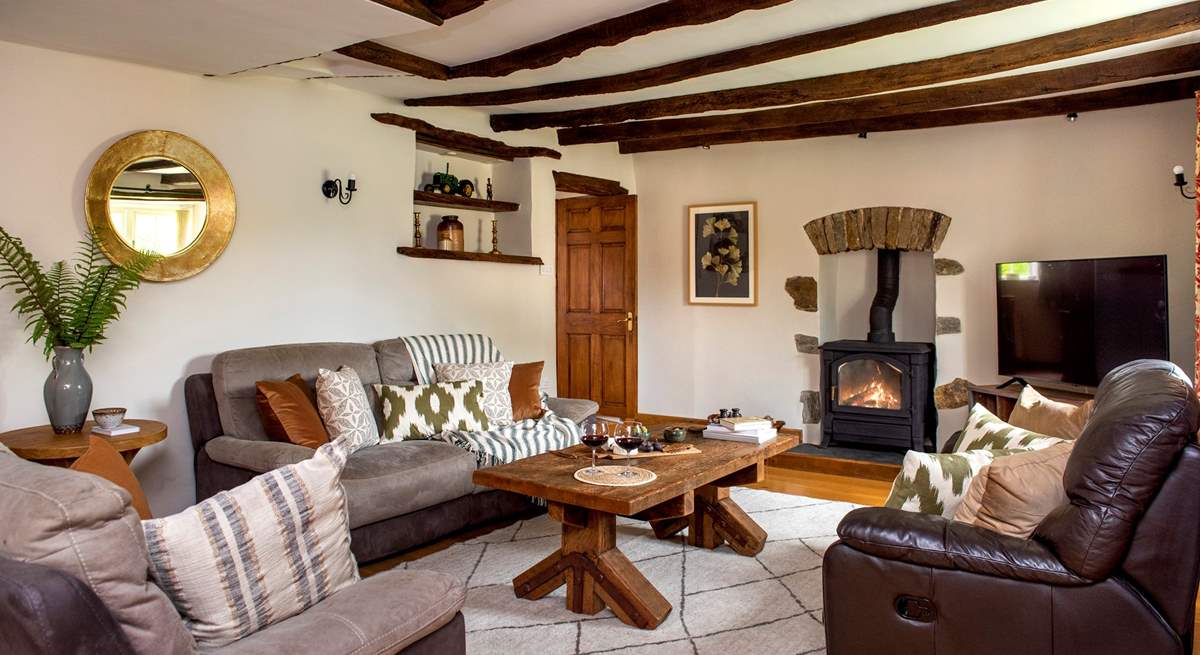 The sitting-room is really spacious and that wood-burning stove makes this the perfect escape any time of the year.