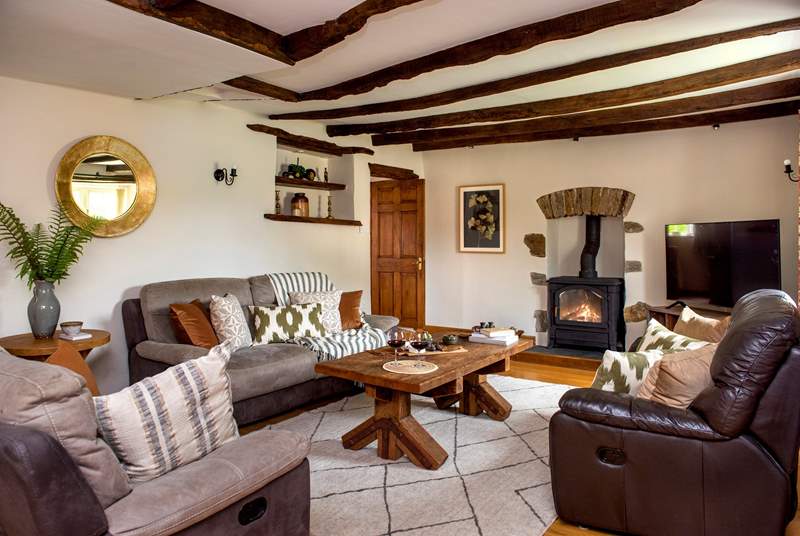 The sitting-room is really spacious and that wood-burning stove makes this the perfect escape any time of the year