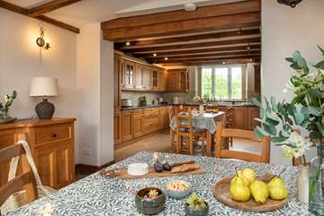 Leading off from the kitchen is the dining-room