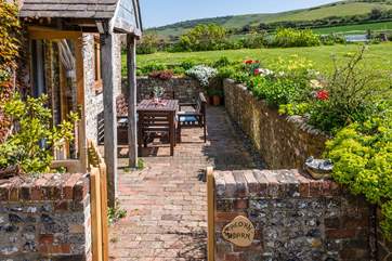 Another seating area with views of the gardens and downs.