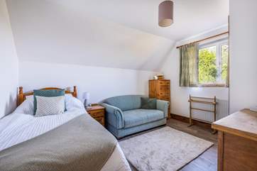 The single bed has a pull-out truckle suitable for a child.
