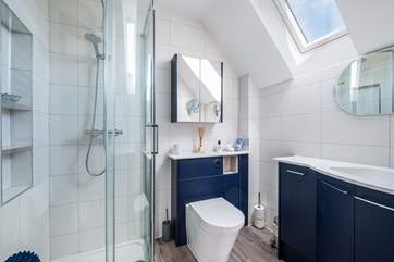 The gorgeous en suite is very sleek.