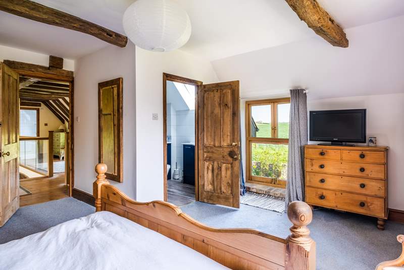 The characterful main bedroom with door leading to the en suite.