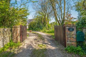 The entrance with double gates to Acorn Barn.