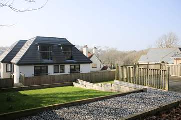 The communal gardens and decking area are at the rear of the property. There will be garden chairs available for your use.