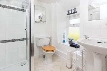 The shower-room is bright and modern.