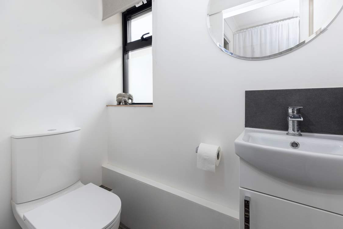 The separate WC and wash-basin.