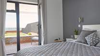 Breakfast in bed whilst you take in the sea view.