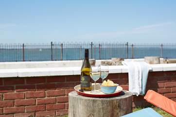 A glass of wine with a sea view!