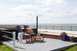 Whether on the veranda or down on the deck there are a number of areas to seat and enjoy the spectacular view of the Solent.