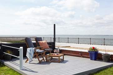 Whether on the veranda or down on the deck there are a number of areas to seat and enjoy the spectacular view of the Solent.