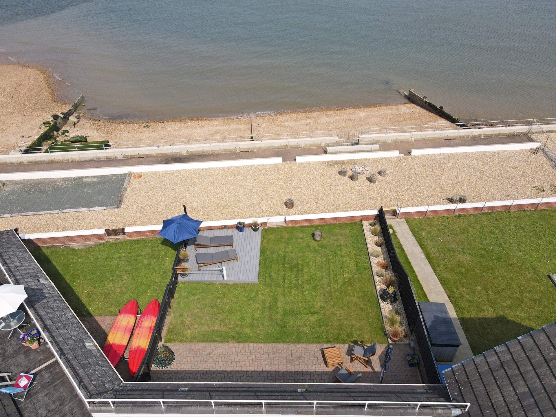 A peaceful beach area can be found at the bottom of the garden, follow the path to the left for your morning dip.