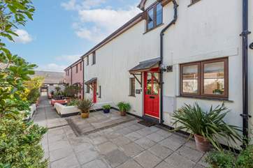 Crows Nest sits in a row of similar cottages.