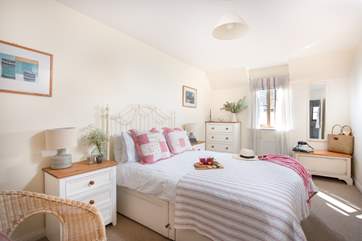 Sweet dreams in the pretty double bedroom.