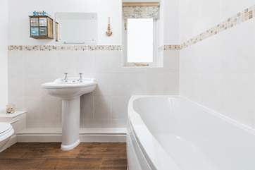 Soak in the bath after a long day at the beach.
