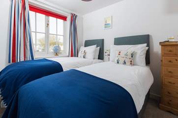 Nautical bedroom 2 has the flexibility to be either twin beds or a king-size double.