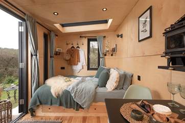 The space is perfectly designed for a romantic escape to nature.
