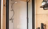 The stylish shower-room is perfect for freshening up in after a day of adventures.  - Thumbnail Image