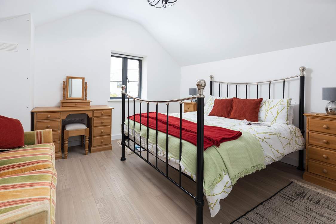 The lovely metal bed in the main bedroom.