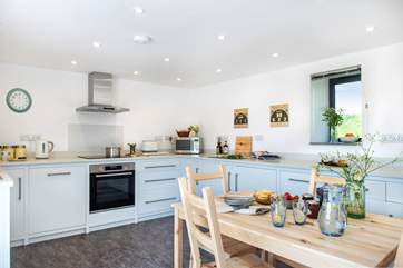 The modern kitchen is a light and airy space.