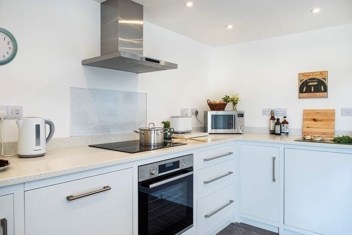 The kitchen has been designed for a cook's enjoyment.