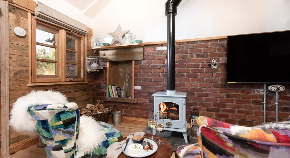 The wood-burner will keep you super cosy throughout the seasons.