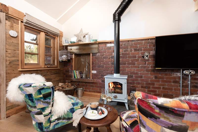 The wood-burner will keep you super cosy throughout the seasons.