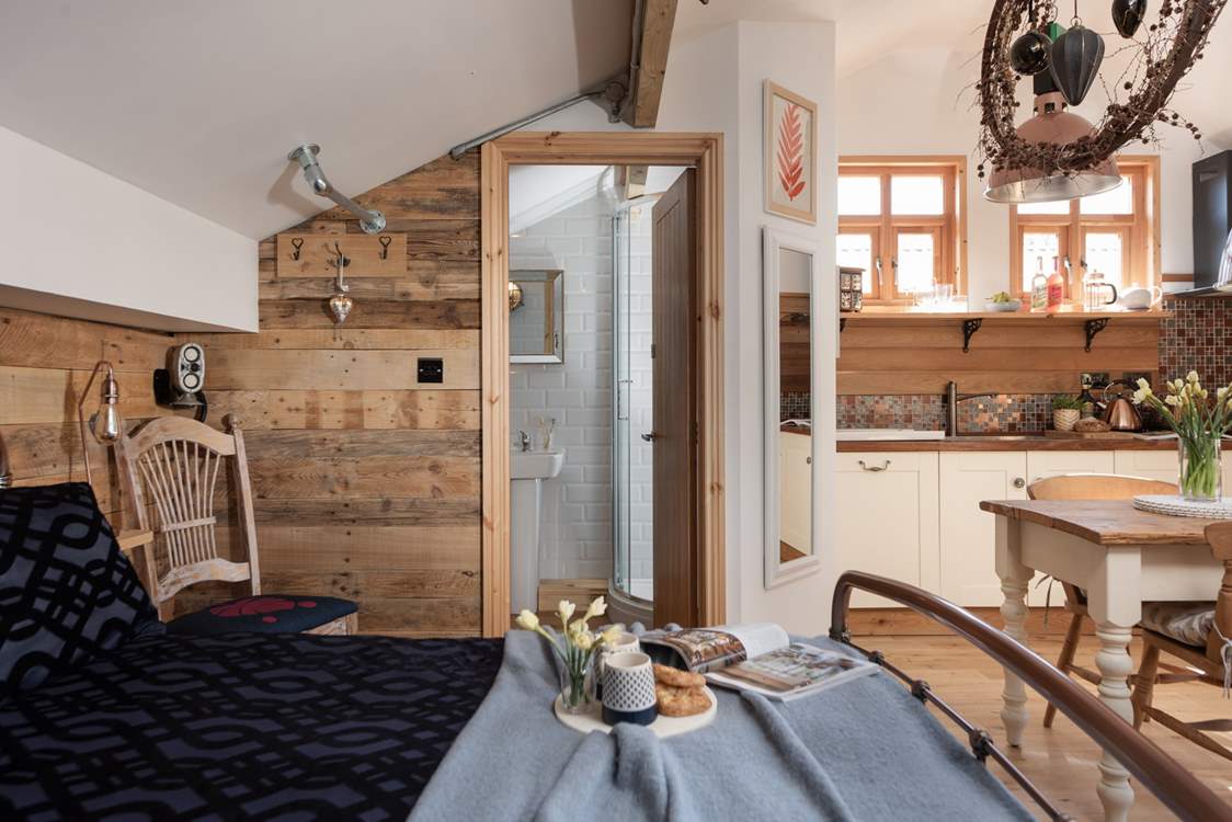 The shower-room is neatly tucked away.