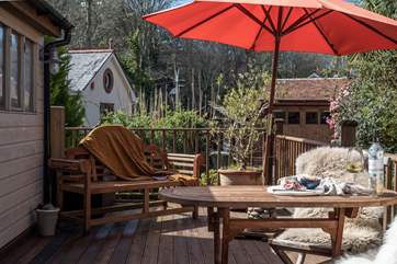 The deck catches the sun throughout the day.