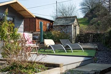 Soak up the evening sun in the terraced garden area at the back, with the open countryside behind