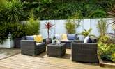 Enjoy relaxing in the sunshine out on the terrace. - Thumbnail Image