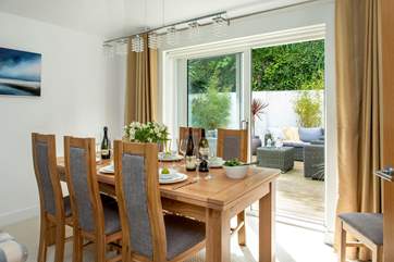Sliding doors lead from the dining area out onto the terrace.