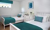 The pretty twin bedroom is on the ground floor. - Thumbnail Image