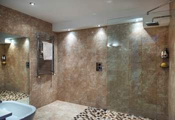On the ground floor is the wet-room, it's huge and perfect for rinsing off when you come in from the beach.