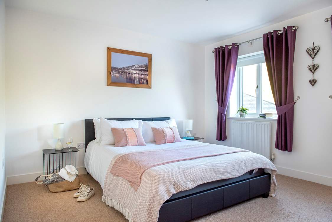 A king-size bed awaits you in bedroom one.