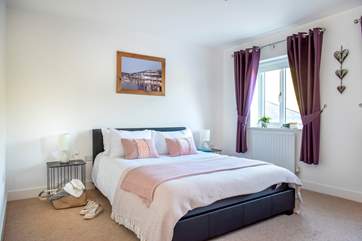 A king-size bed awaits you in bedroom one.