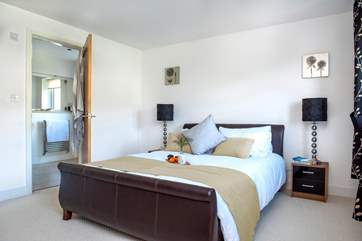 Bedroom three has a king-size sleigh bed.