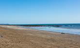 The beach at Seaton, when the tide is out you can walk all the way along the headland to Rame Head. - Thumbnail Image