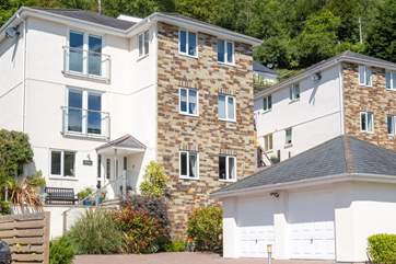 Welcome to Carwin, an impressive three-storey modern seaside home.