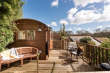 The wooden exterior and decking gives the hut a beautiful rustic look.