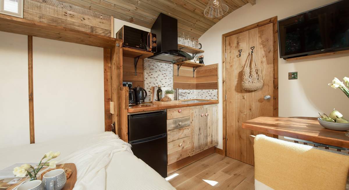 A compact kitchen can be found at the rear of the hut and has everything you will need.